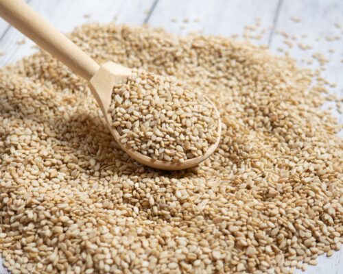 Spoonful of sesame seeds on surface
