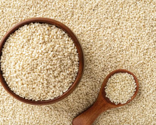 Bowl and spoon of sesame seeds