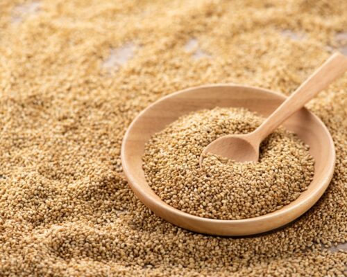 Plate of sesame seeds with spoon